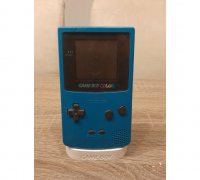 3D file GAMEBOY COLOR STAND WITH 5X GAME CARTRIDGES HOLDER 🎨・3D