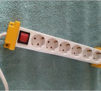 https://img1.yeggi.com/page_images_cache/3739625_powerstrip-mounting-solution-steckdosenleiste-halterung-by-symbadisch