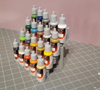 STL file Modular Paint Bottle Rack for Revell Paint Jars. Airbrush paint,  paint bottle, modular, wall mount, organization, model paint, art tool,  paint rack, paint organizer, storage, airbrush, desk organizer, wall rack