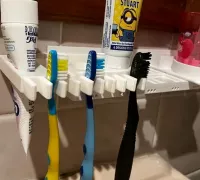 https://img1.yeggi.com/page_images_cache/5904085_gridfinity-toothpaste-and-brush-holder-by-emboli