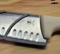 https://img1.yeggi.com/page_images_cache/5932285_magnetic-knife-sheath-for-santoku-knife-by-bryanpryor