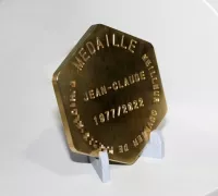 Support à médaille