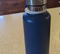 https://img1.yeggi.com/page_images_cache/6263251_water-bottle-lid-keeper-by-crazybilly