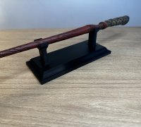 https://img1.yeggi.com/page_images_cache/6677809_harry-potter-wand-stand-display-3d-printable-model-to-download-