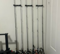 Wall-mounted fishing rod holder with LED light