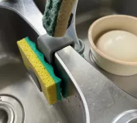 https://img1.yeggi.com/page_images_cache/6877133_sink-sponge-and-dish-wand-holder-by-contact411